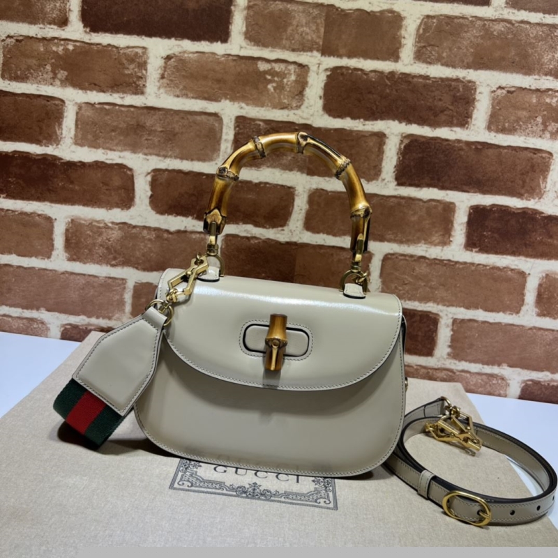 G*u*i top handle bags